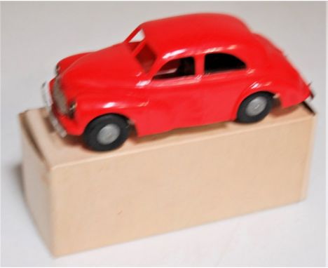 Triang Minic Post War, Morris Oxford, friction drive, red plastic body with cast hubs, chrome grille, in the original white a