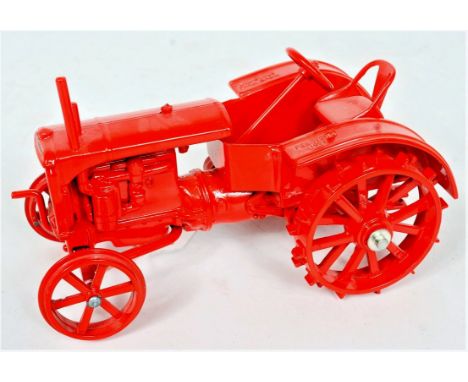 A heavy diecast model of a Allis Chalmers WC Spud Wheel Tractor, released for the Louisville 1992 farm show, finished in oran
