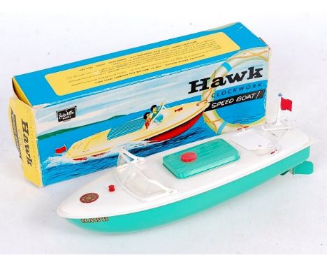Sutcliffe Models, Hawk Speedboat, clockwork, light green hull with white deck, red bung with original flag, in the original a