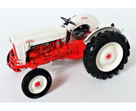 Franklin Mint, 1/12th scale diecast model of the 1953 Ford Jubilee Tractor, white and red body with black seat, black rubber 