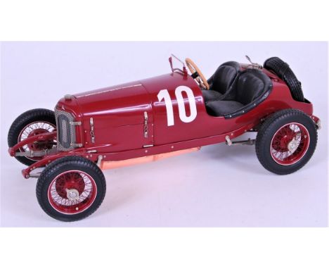 CMC Exclusive Models M-048 1/18th scale model of a Mercedes Targa Florio 1964, finished in maroon, in the original box (NMM-B