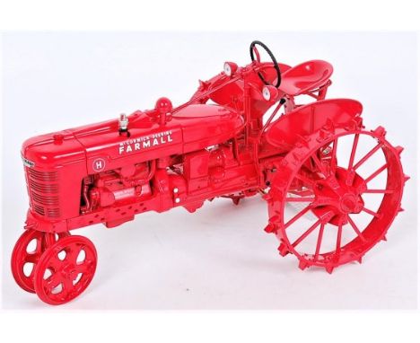 Franklin Mint, 1/12th scale diecast model of a McCormick Farmall model H steel wheel tractor, red gloss body with silver exha