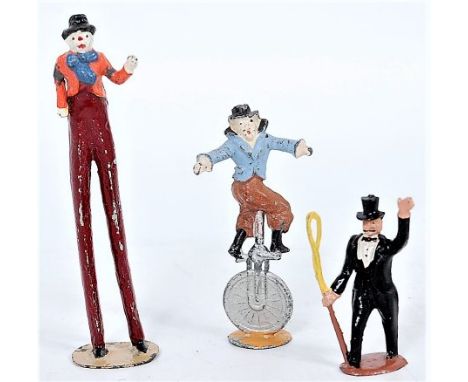 Timpo, scarce ringmaster with whip, plus, Charbens clown riding unicycle rare item and a Charbens clown on stilts possibly re