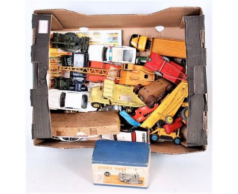 A collection of mixed playworn boxed and diecast related ephemera to include Dinky toys 563 heavy tractor, Dinky toys Euclid 