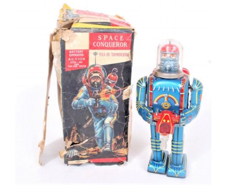 Daiya (Japan) tinplate and battery operated Space Conqueror Robot, 28cm, blue tin printed body with clear space helmet, missi