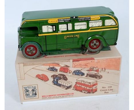 Wells Brimtoy tinplate clockwork Greenline Bus - dark green with yellow trim, tinprinted window detail, the clockwork mechani