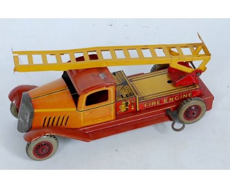 Wells of London, tinplate and clockwork fire engine, red and yellow body with yellow extendable ladder, fading to bonnet, mis