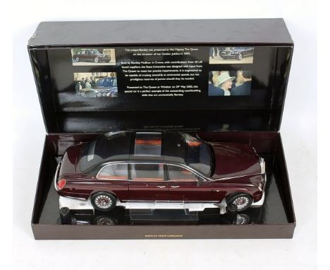 Minichamps 1/18th scale Bentley State Limousine, maroon body, clear and black roof, blue/grey interior, in the original polys