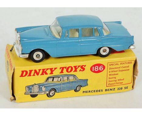 Dinky Toys, 186 Mercedes Benz 220 SE in RAF blue, off-white interior and black gloss base, finished with spun hubs, sold in l