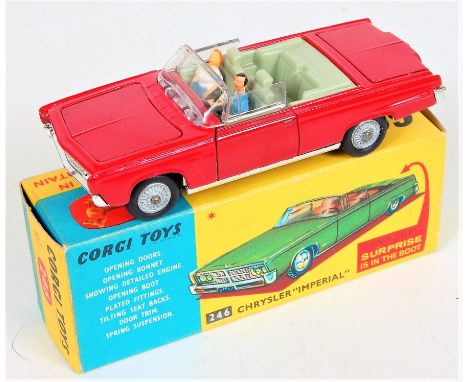 Corgi Toys, 246 Chrysler Imperial convertible, deep red body with light blue interior, with driver figure, passenger and golf