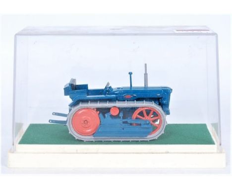 White metal Fordson Super Major 'County' Crawler tractor, 1:43 scale blue/orange no defects noticed on baize covered plastic 