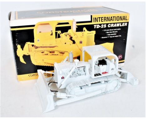 First Gear, 1/25 scale diecast models of an International TD-25 crawler bulldozer, finished in white, 11" long in polystyrene