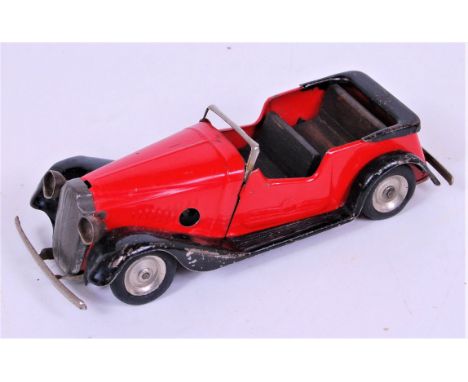 Triang Minic Post War Tinplate and Clockwork 4 Seater Open Top Tourer, red body with black running boards and spun hubs, loos