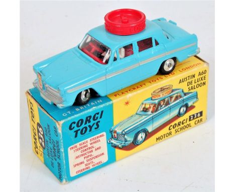 Corgi Toys, 236, Corgi Motor School Car, light blue body with silver flash, spun hubs, 2 figures, with the original all card 