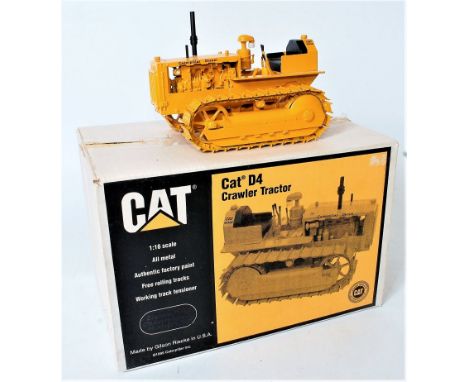 Gilson Riecke 1/16th scale white metal model of a CAT D4 Crawler Tractor, finished in CAT yellow, in the original foam packed