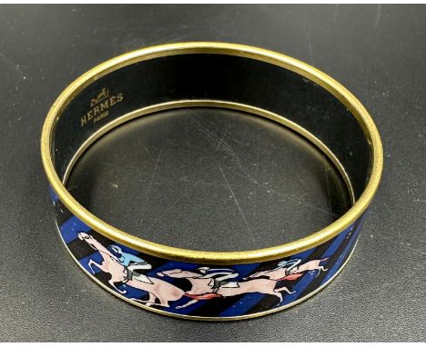 A horse racing themed bangle by Hermes, made in Austria