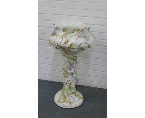 An Italian floral encrusted pottery jardiniere planter and stand, 78cm (2) 