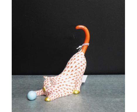 A Herend porcelain figure of a 'Cat playing with a Ball', 13cm high