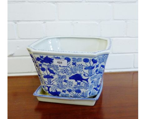 A Moyses Stevens of London blue and white planter 