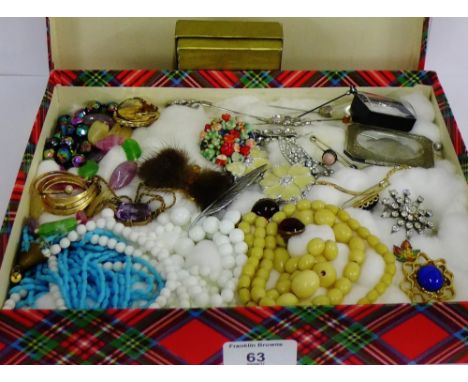 A collection of vintage costume jewellery to include brooches, beads, hat pins studs etc, together with a Reville Coronation 