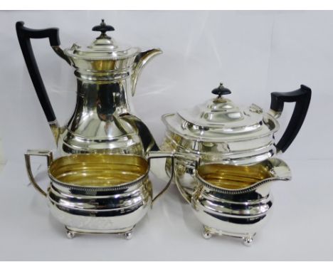 George VI silver tea and coffee set with makers marks for Wilson & Sharp, Sheffield 1937, comprising coffee pot, teapot, milk