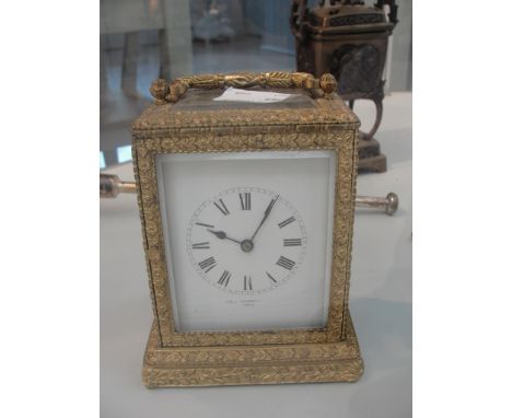 A French gilt carriage clock