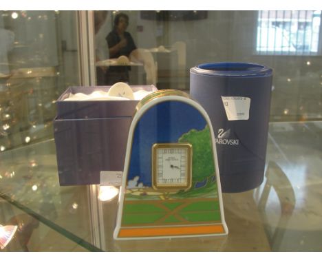 A Royal Worcester Art Deco 'Lazy Days' clock; together with a boxed Swarovski two-colour parrot and a Herend miniature peacoc