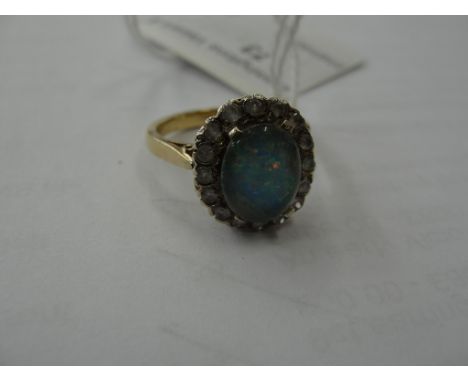 Opal and diamond dress ring