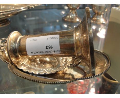 An .800 silver candlestick; together with two bon bon dishes