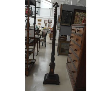 An Edwardian mahogany standard lamp