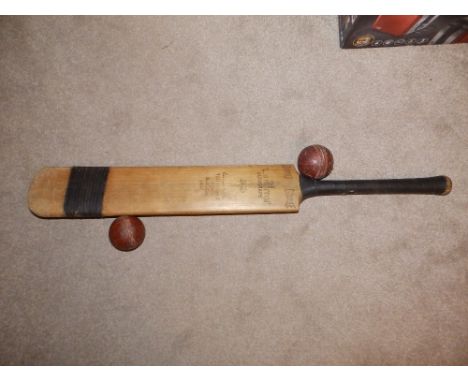 A Len Hutton Autograph cricket bat and two balls. (3)