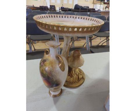 A damaged Royal Worcester grouse centrepiece, 9.25”, together with a damaged vase painted still life fruit by Ricketts. (2)