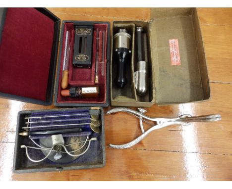 A 19thC ENT examination set, an operative vaginal speculum, a carbon dioxide sparklet stick and a Sahli haemoglobinometer. (4