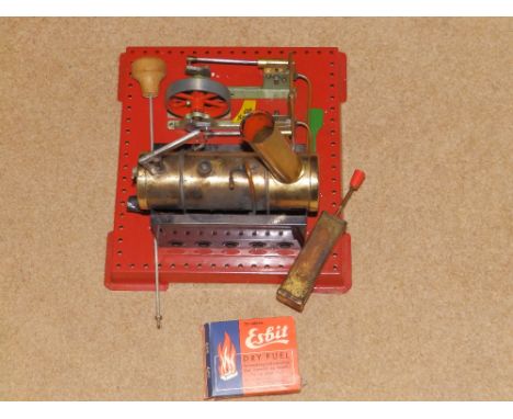 A boxed Mamod twin cylinder super-heated steam engine.