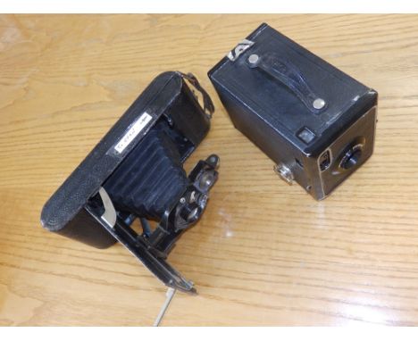 A Goerz folding lens camera and a Box Brownie. (2)