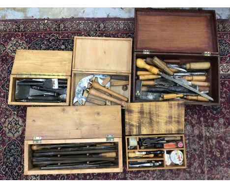 Five boxes of antique and vintage woodworking tools, including chisels, rasps, knives, etc