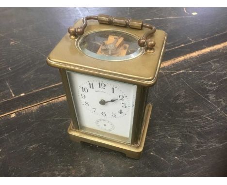 Late 19th / early 20th century brass carriage clock, indistinctly signed Hamilton &amp; Co., with subsidiary alarm dial