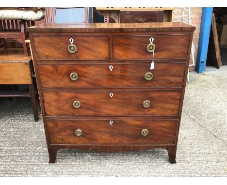 George III mahogany chest of two short and three long drawers with brass ring handles, on bracket feet H107, W103, D34cmCondi