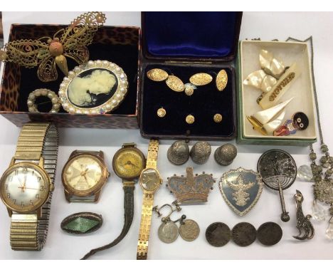 Costume jewellery including silver brooches, cased set of gold plated cufflinks and studs, three silver thimbles, vintage wri