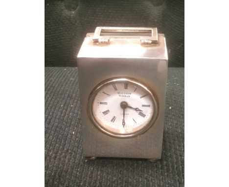 Silver carriage clock by Matthew Norman, approximately 7cm highCondition report: Case in good order with some minor surface s