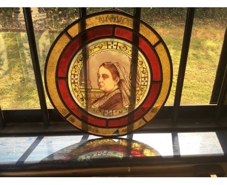Victorian stained glass circular panel, painted depicting a portrait of Queen Victoria, dated 1887, commemorating the Golden 