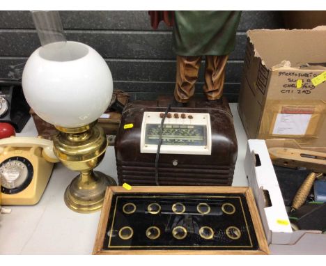 Early 20th century servants' bell box, together with a Bush Bakelite radio and a brass oil lamp (3)