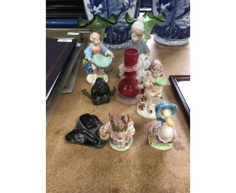 Two Inuit carvings, a Dresden figure, two Beswick Beatrix Potter figures and other ceramics and glass