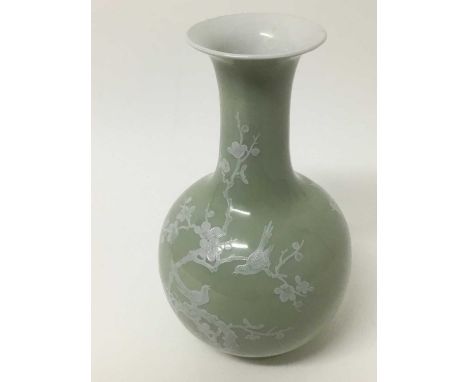 18th century style Chinese celedon glazed porcelain vase, baluster form with white enamelled ornament and seal marks to base,