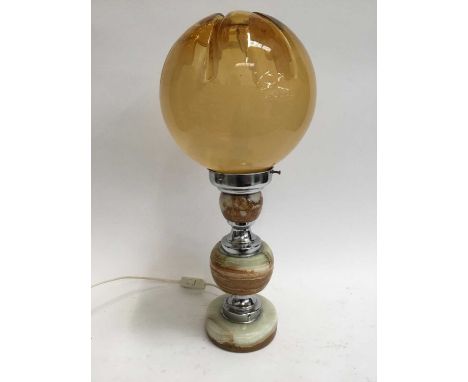 Stylish mid 20th century lamp with onyx and chrome body with amber glass shade, 56cm high overall
