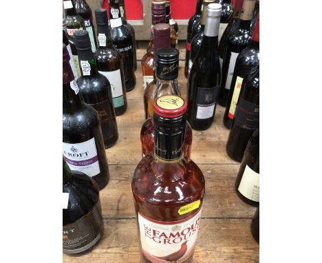 Five bottles of scotch whisky, together with two bottles of Drambuie