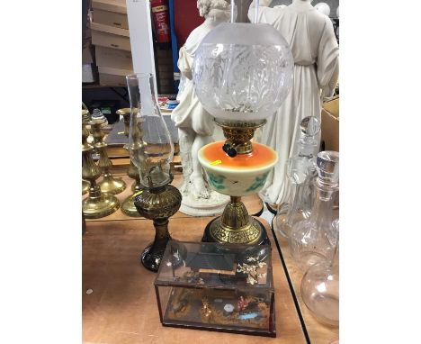 Early 20th century oil lamp, together with another oil lamp and a Chinese diorama (3)