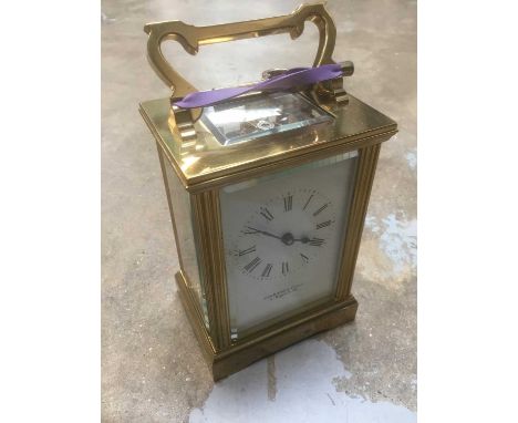Brass carriage clock by Garrard &amp; Co, approximately 15cm high