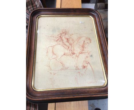 Pen and ink sketch of a man riding a horse, framed and glazed