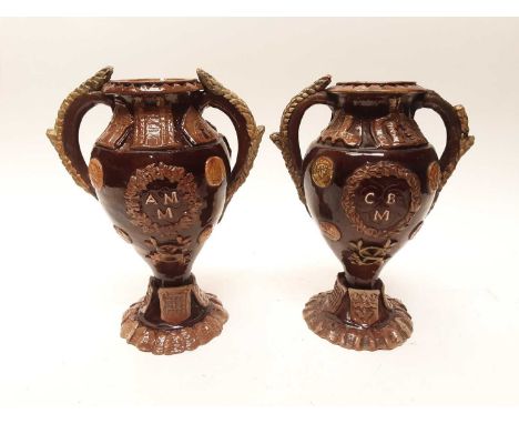 Pair of Castle Hedingham Edward Bingham brown glazed twin handled pottery vases, 28cm highCondition report: Both are badly da